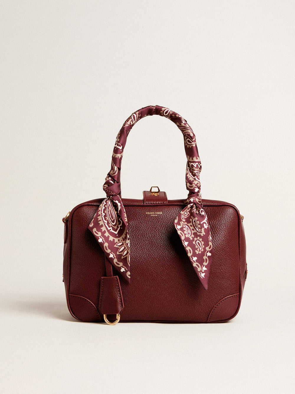 Vita Bag in burgundy leather with gold details
