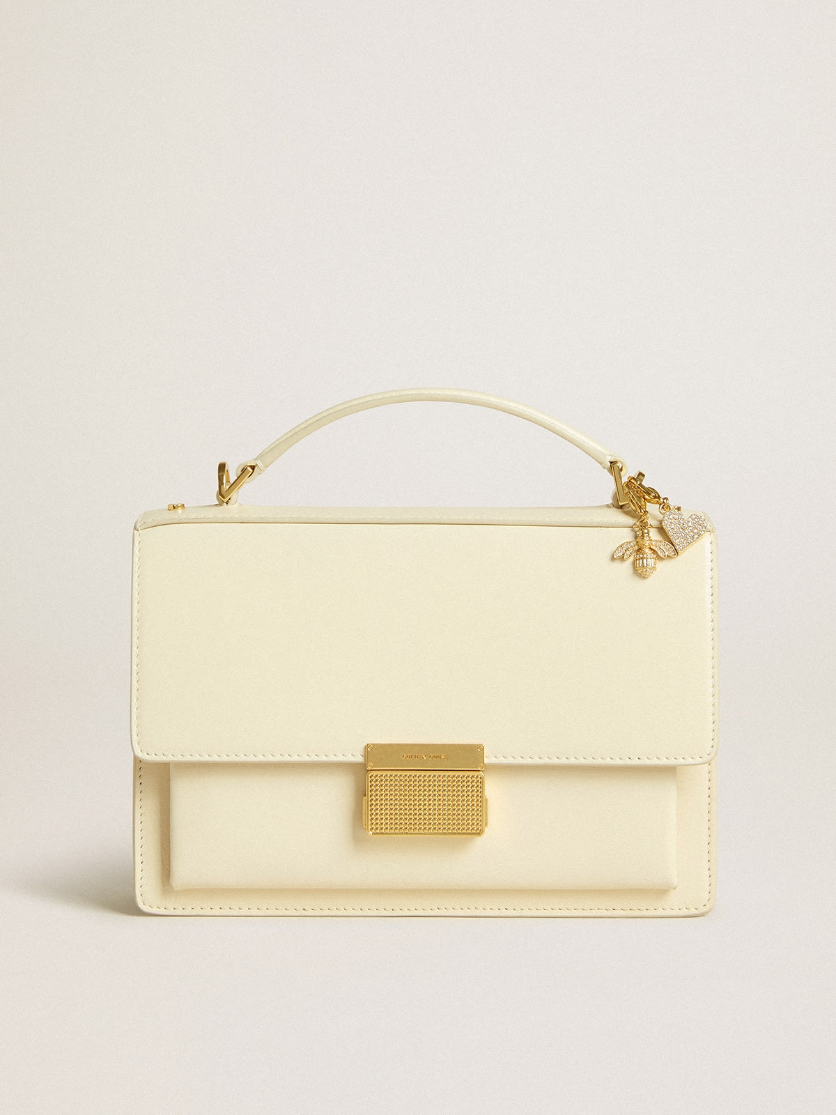 Venezia Bag in butter-colored boarded leather with double charm