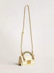 Small Venezia Bag in butter-colored boarded leather with braided scarf and double charm