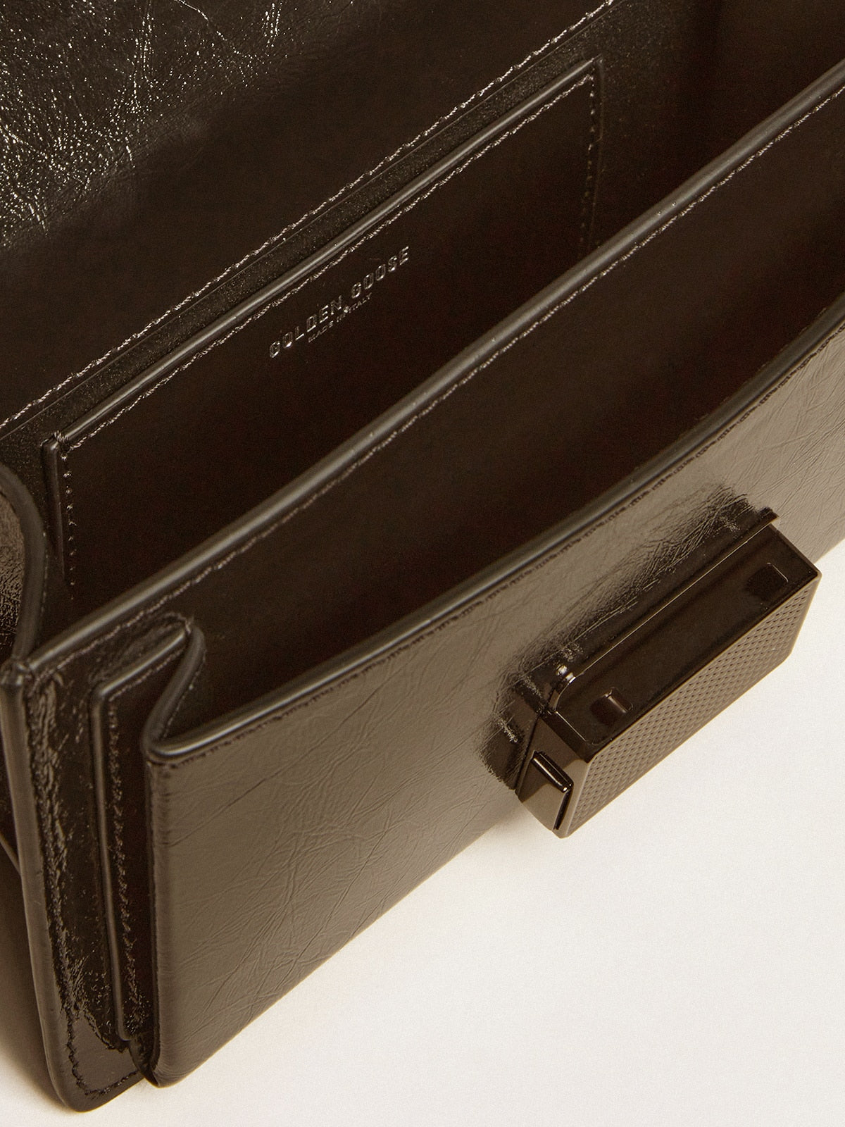 Small Venezia Bag in black metallic leather with black details