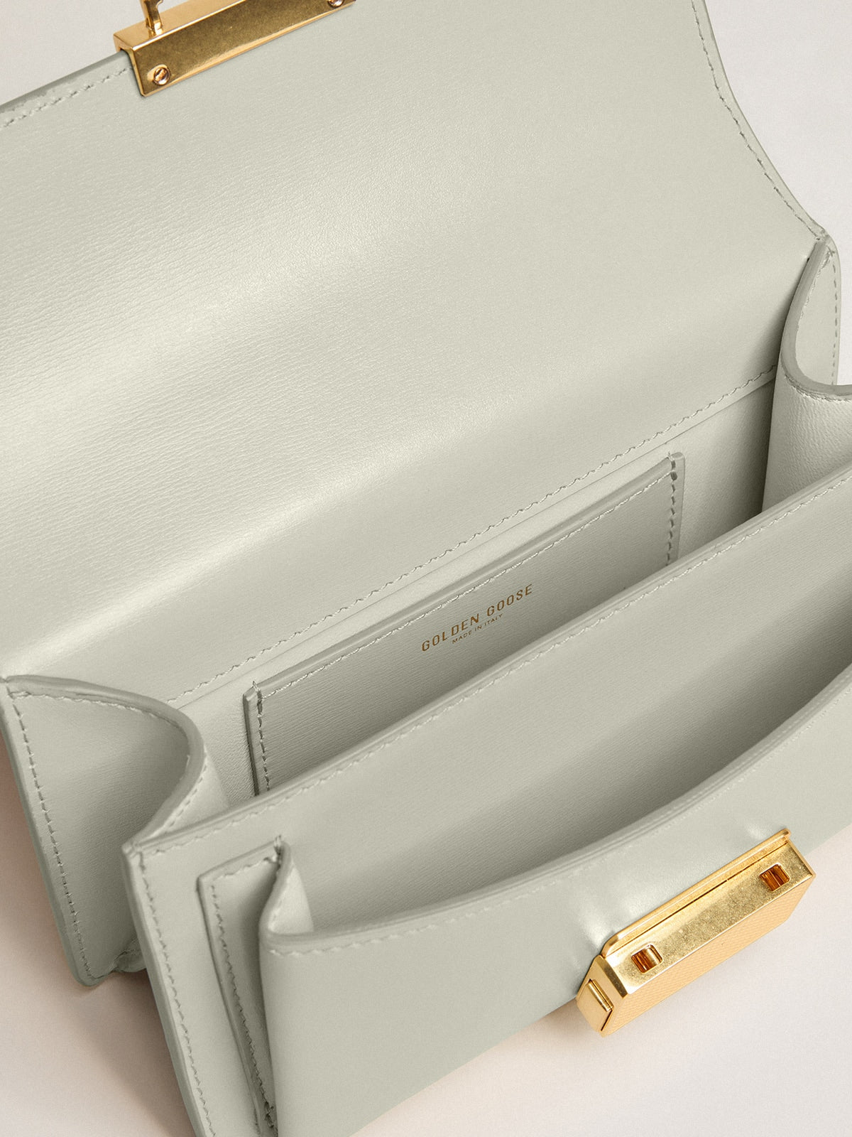 Small Venezia Bag in mineral-gray boarded leather with gold details