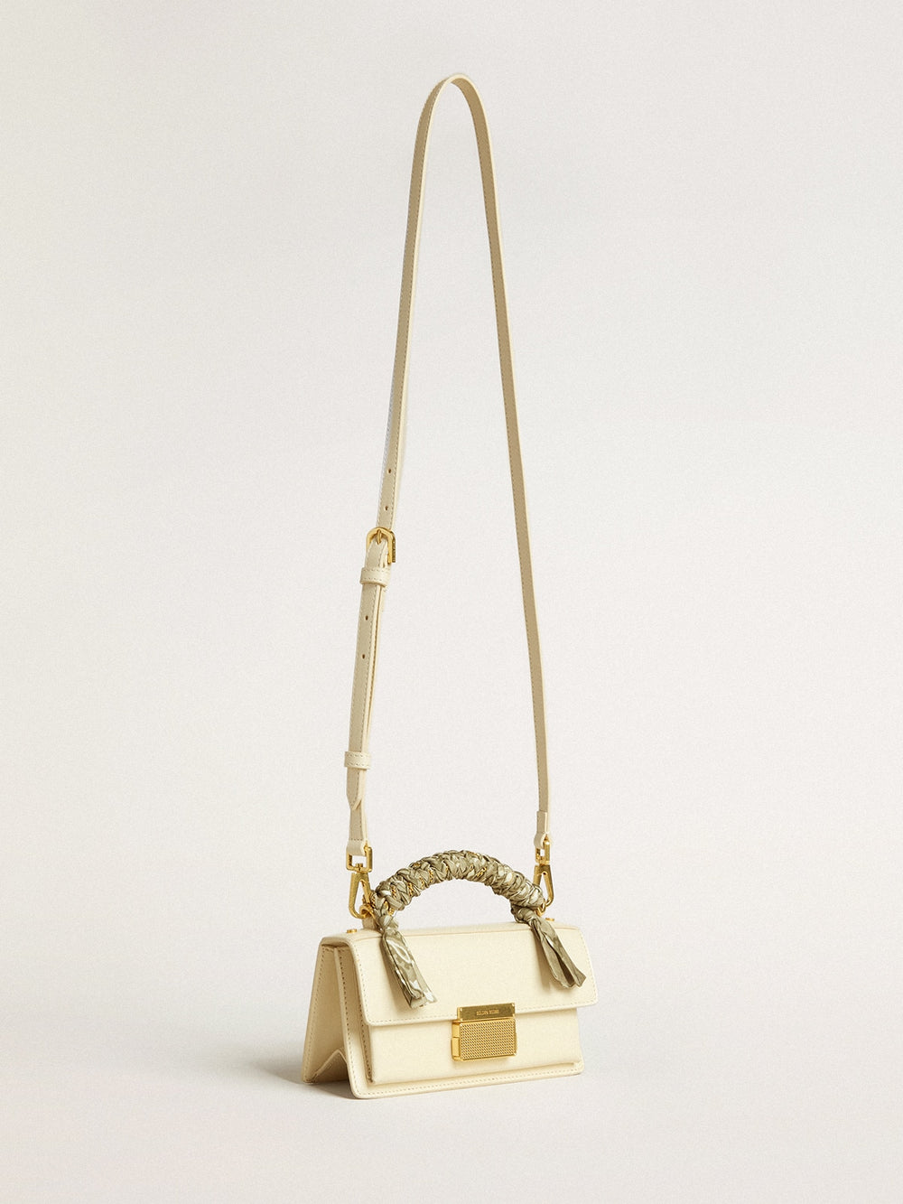 Small Venezia Bag in butter-colored boarded leather with braided scarf