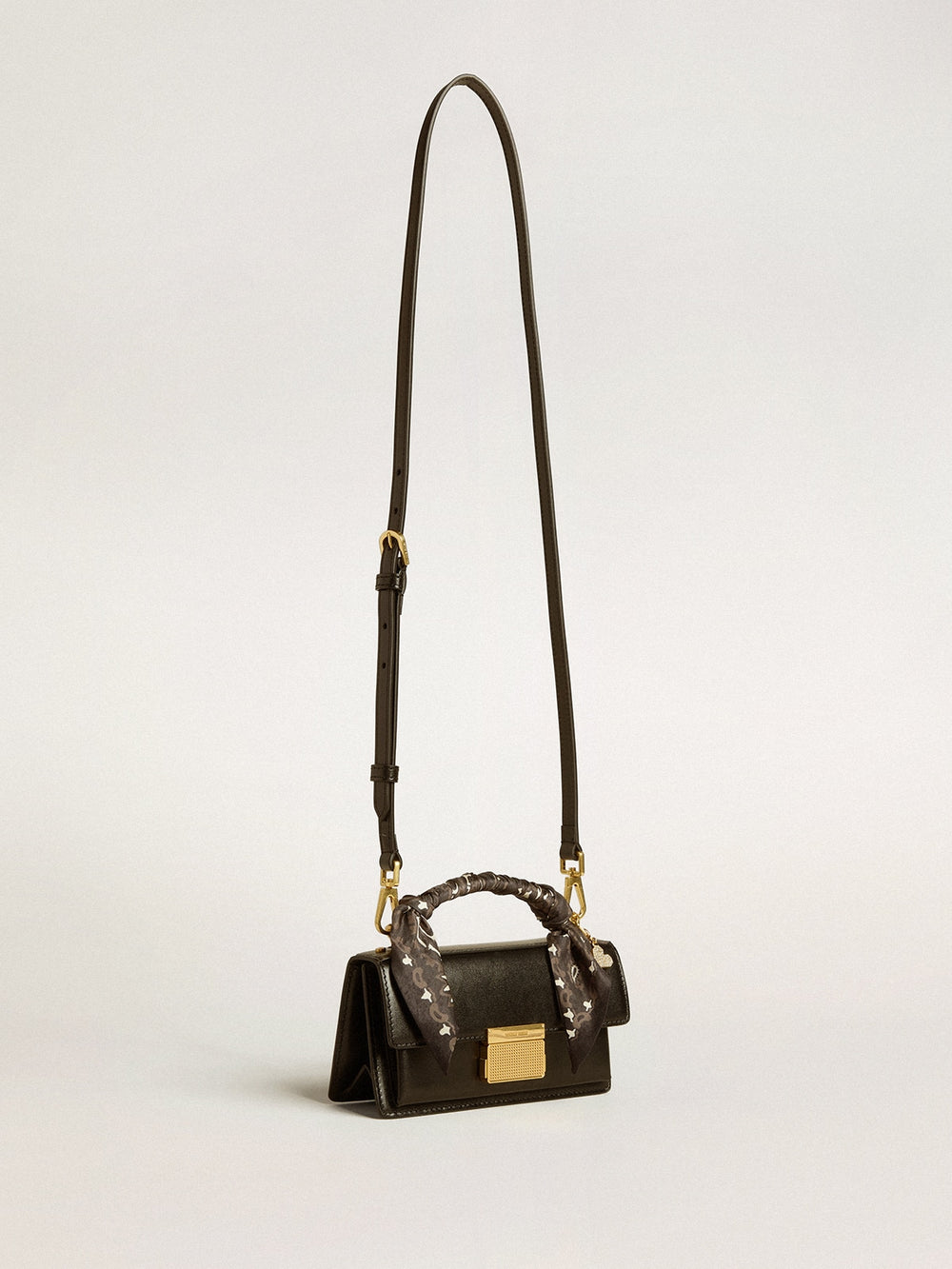Small Venezia Bag in black boarded leather with silk scarf and charm