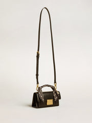 Small Venezia Bag in black boarded leather with silk scarf and charm