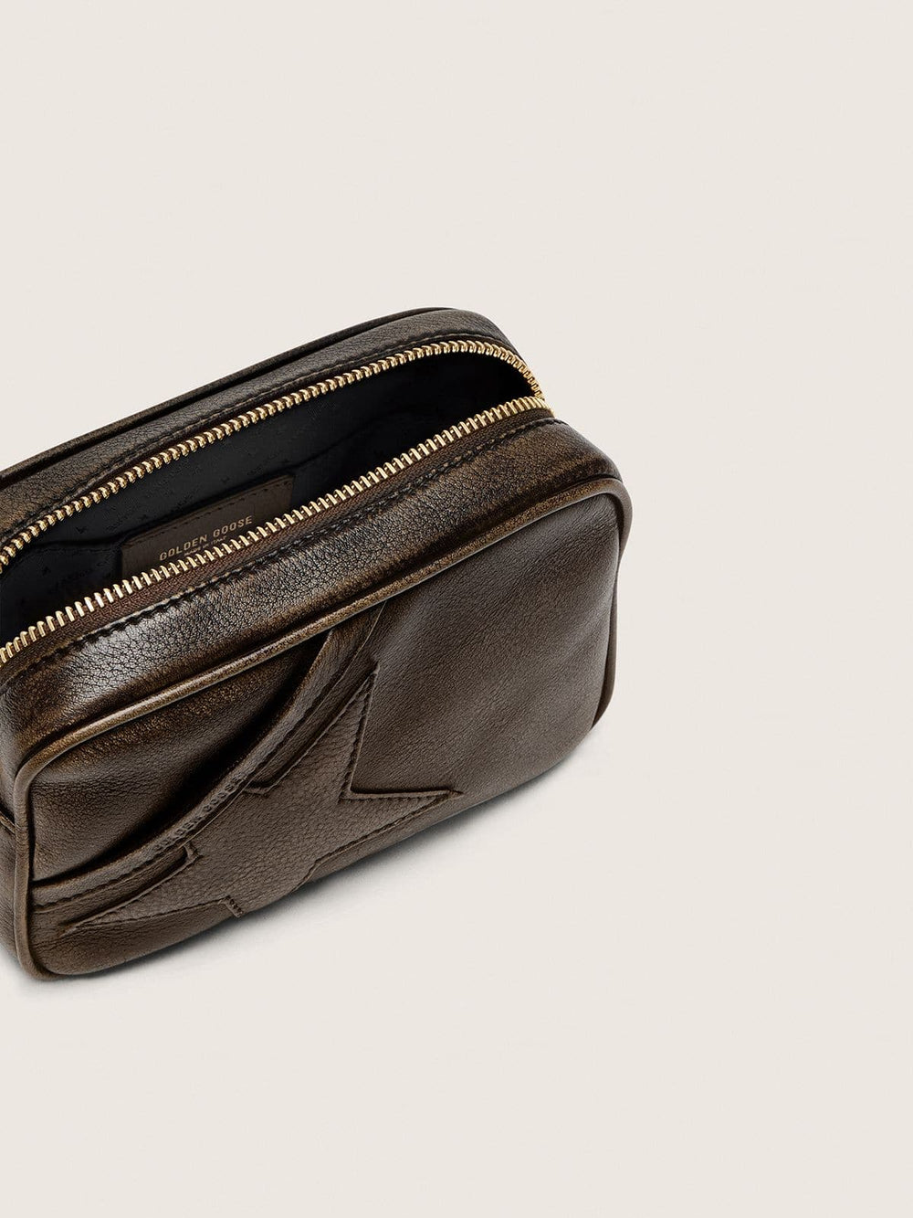 Mini Star Bag in distressed dark-brown leather with tone-on-tone star