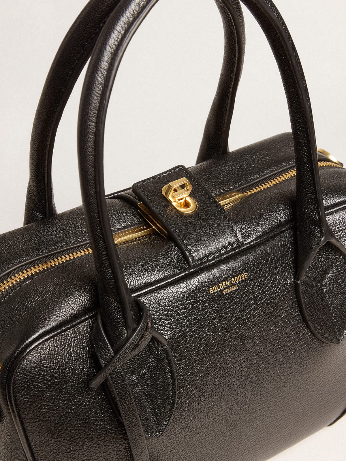 Vita Bag in black sheepskin leather with gold details