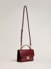 Venezia Bag in burgundy boarded leather with gold details