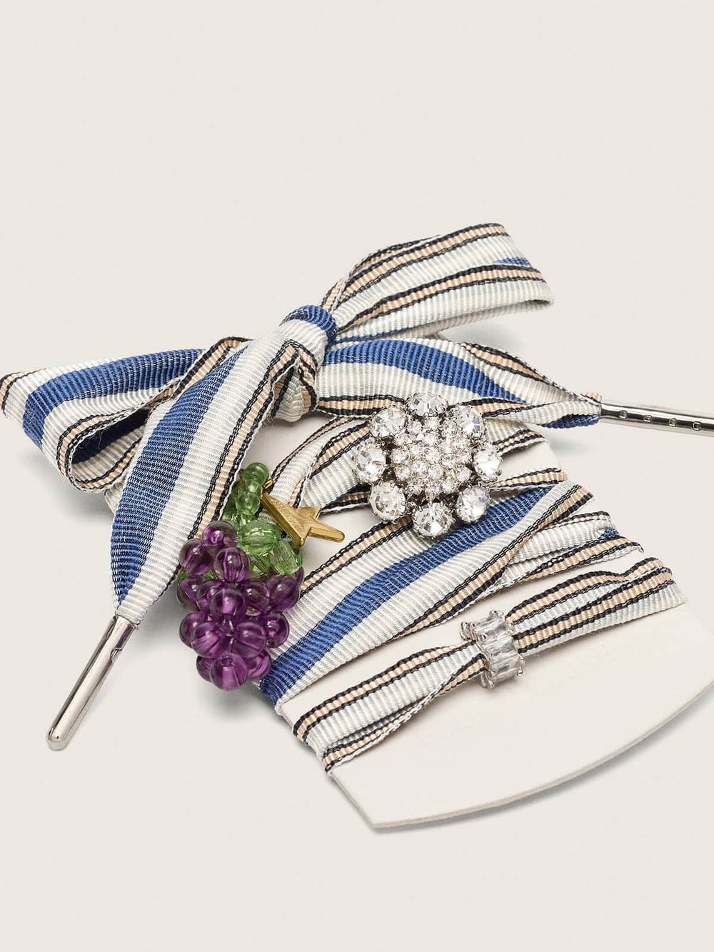 Skins striped laces with grape and crystal charms