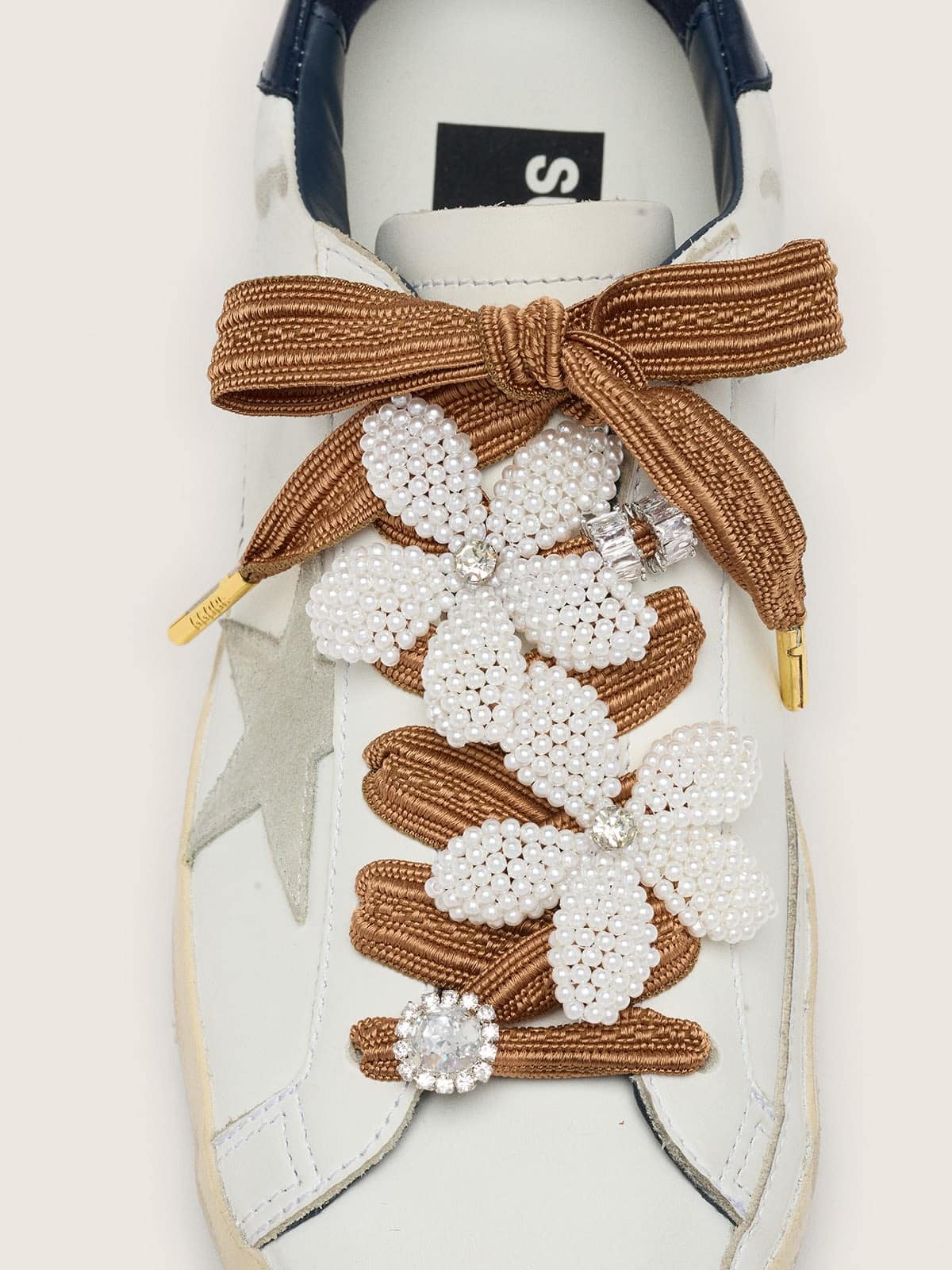 Skins burgundy and peach striped laces with beaded and crystal charms