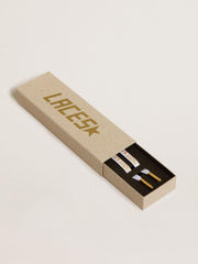 White cotton laces with contrasting gold logo