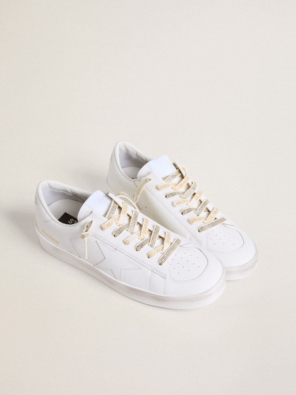 Cotton laces with silver Swarovski crystals and gold-colored logo