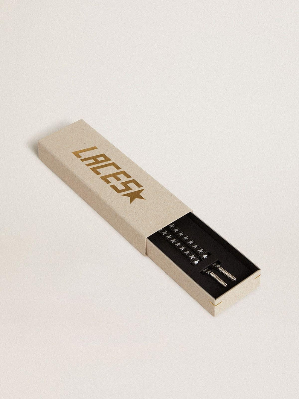 Black cotton laces with contrasting silver stars