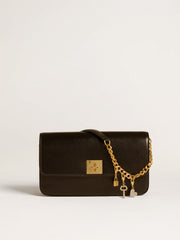 Key-shaped charm in gold-colored brass with crystals