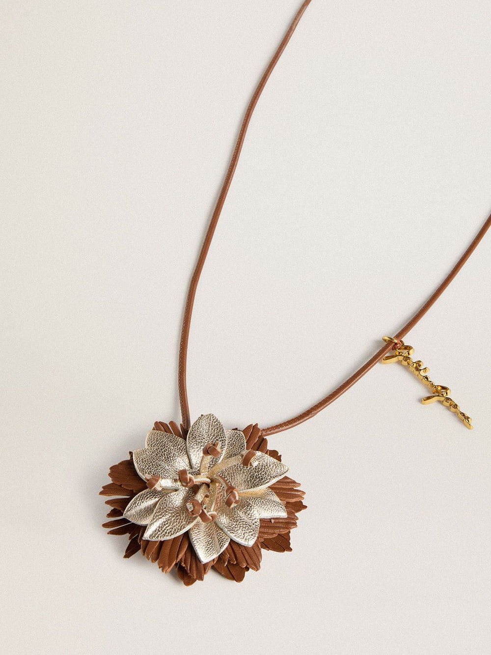 Pendant flower charm in tan and champagne leather