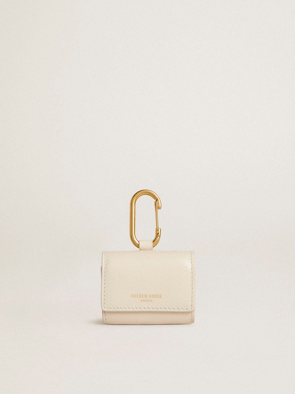 Worn white AirPod case