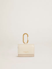 Worn white AirPod case