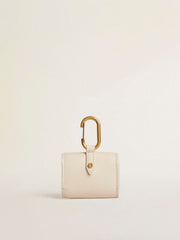 Worn white AirPod case