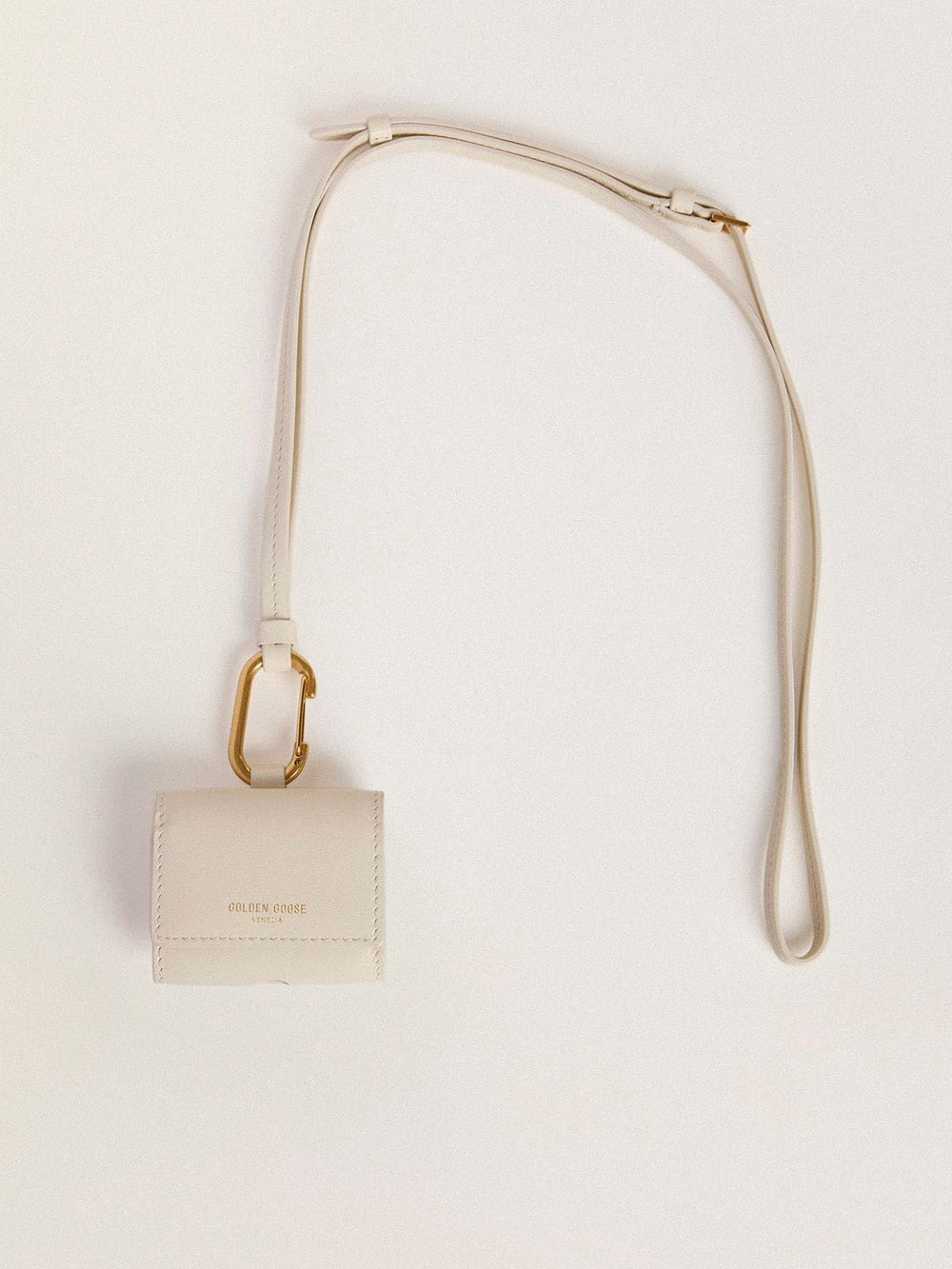 Worn white AirPod case