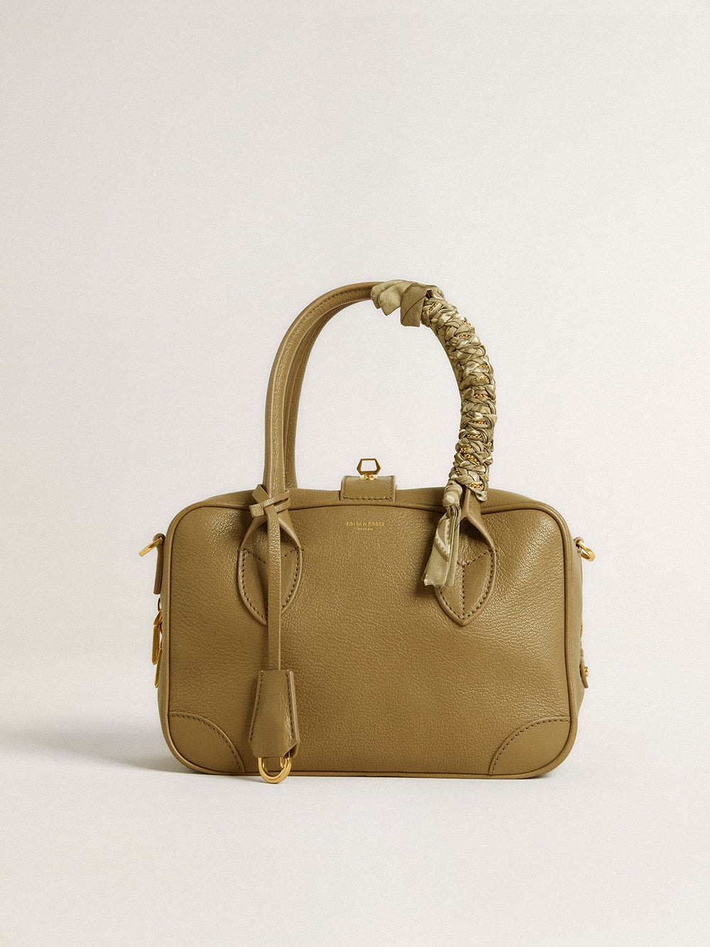 Dove-gray braided fabric charm with brass chain