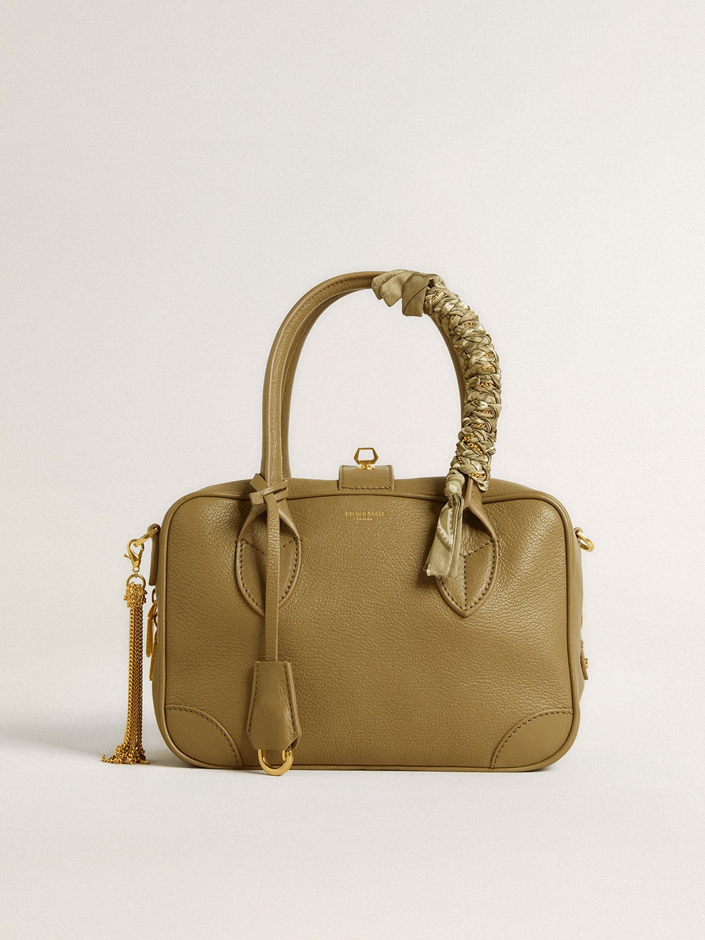 Dove-gray braided fabric charm with brass chain