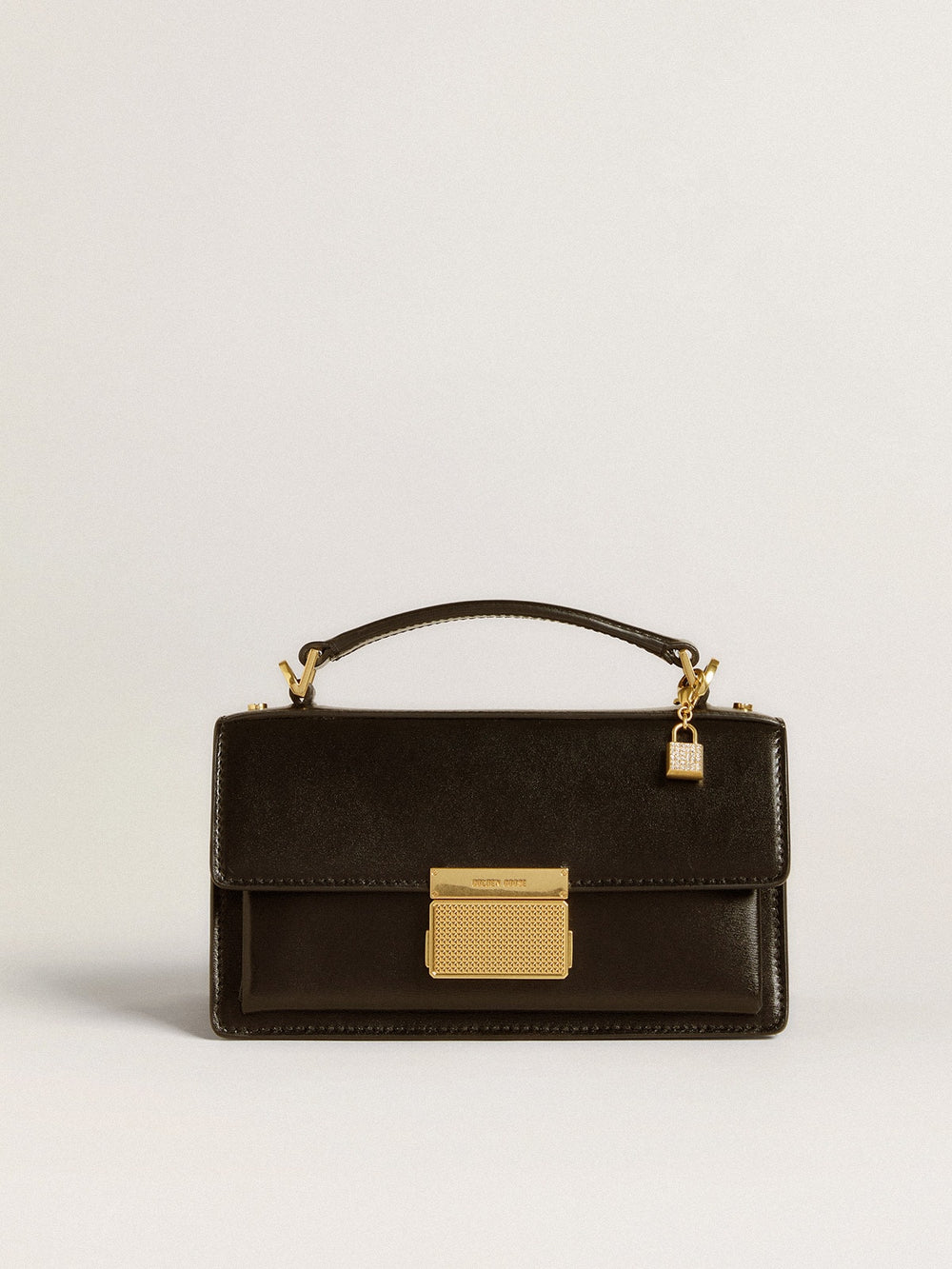 Lock-shaped charm in gold-colored brass with crystals