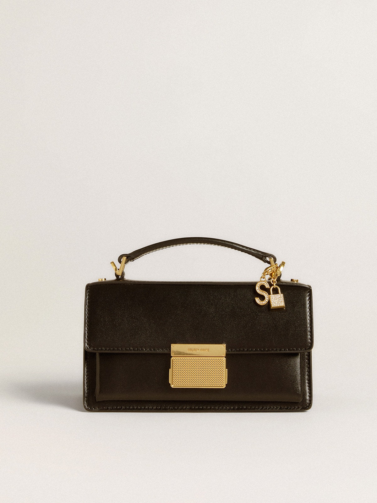 Lock-shaped charm in gold-colored brass with crystals