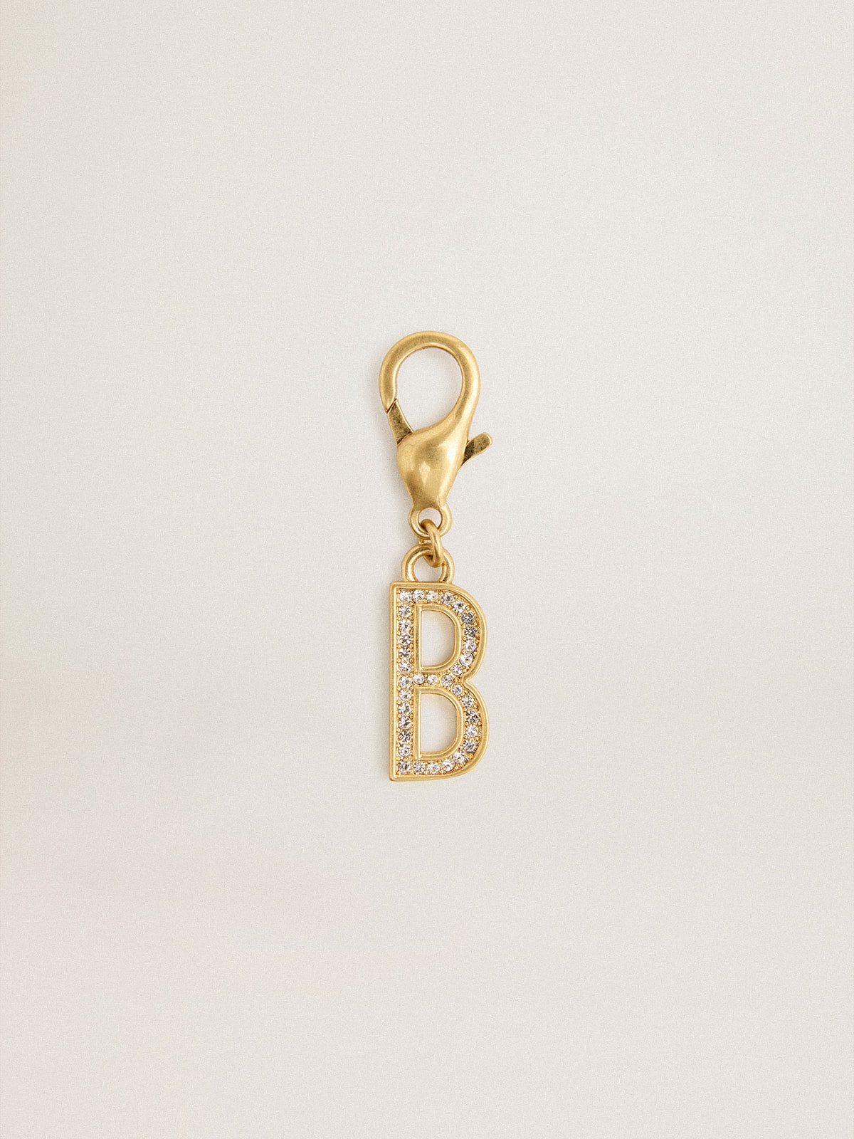 Letter B charm in gold-colored brass with crystals