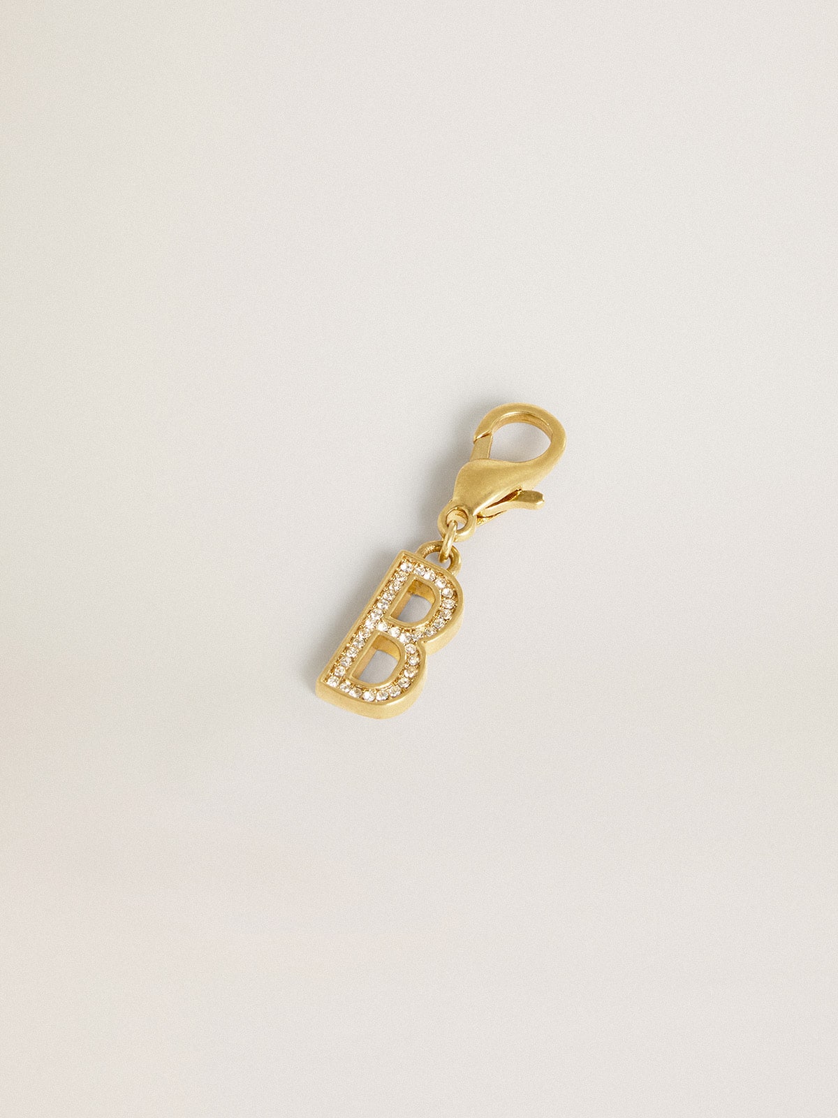 Letter B charm in gold-colored brass with crystals