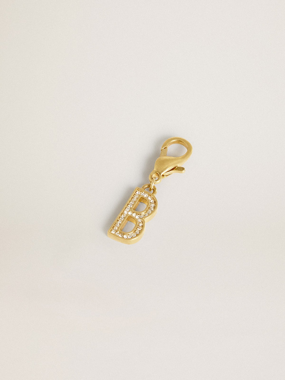 Letter B charm in gold-colored brass with crystals