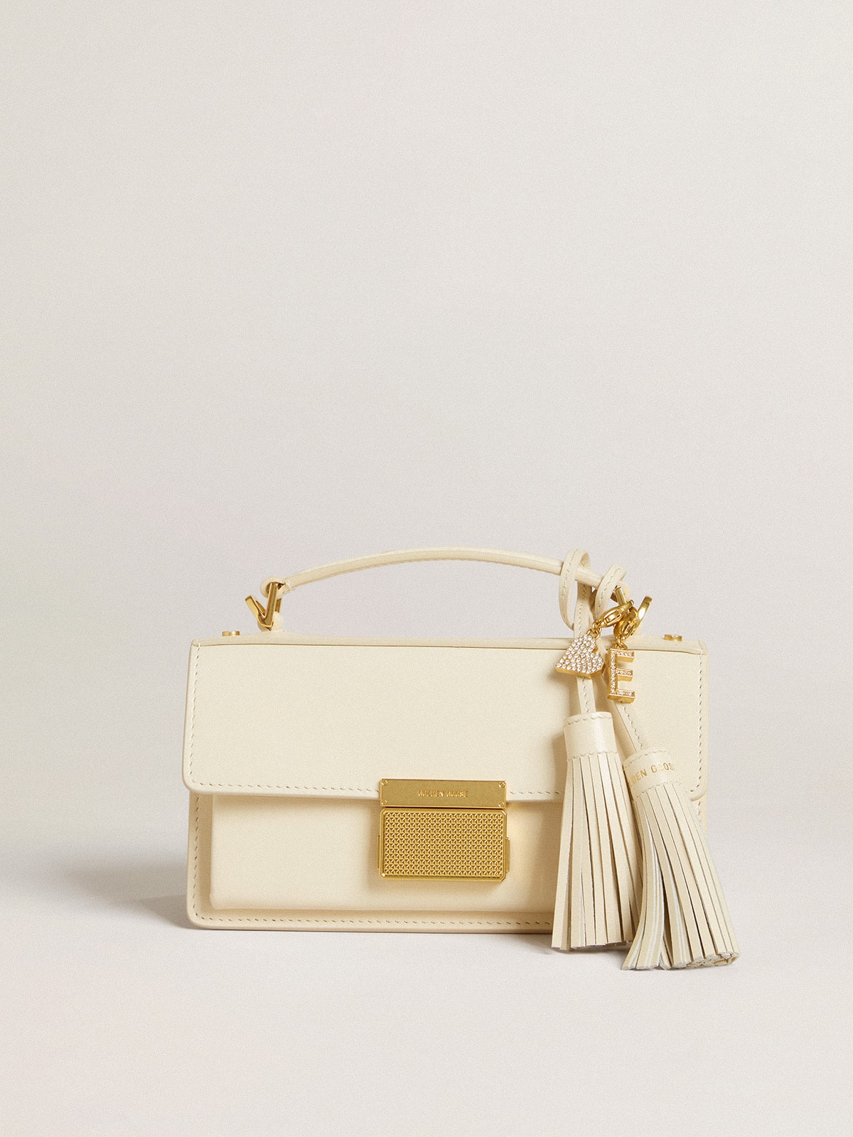 Letter E charm in gold-colored brass with crystals