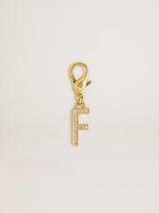 Letter F charm in gold-colored brass with crystals