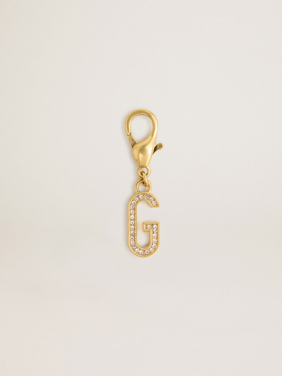 Letter G charm in gold-colored brass with crystals
