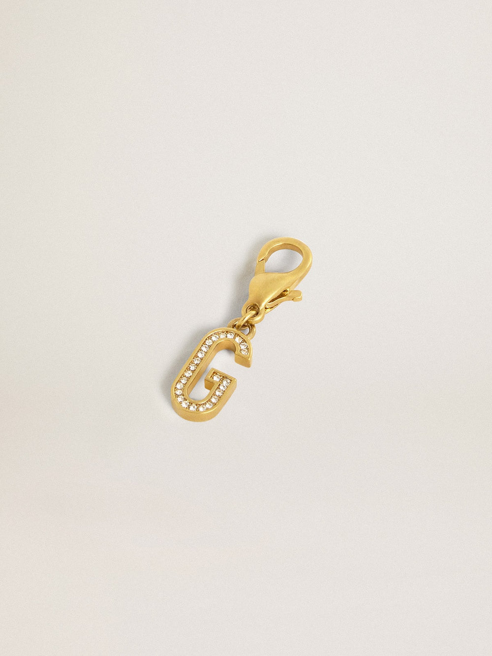 Letter G charm in gold-colored brass with crystals