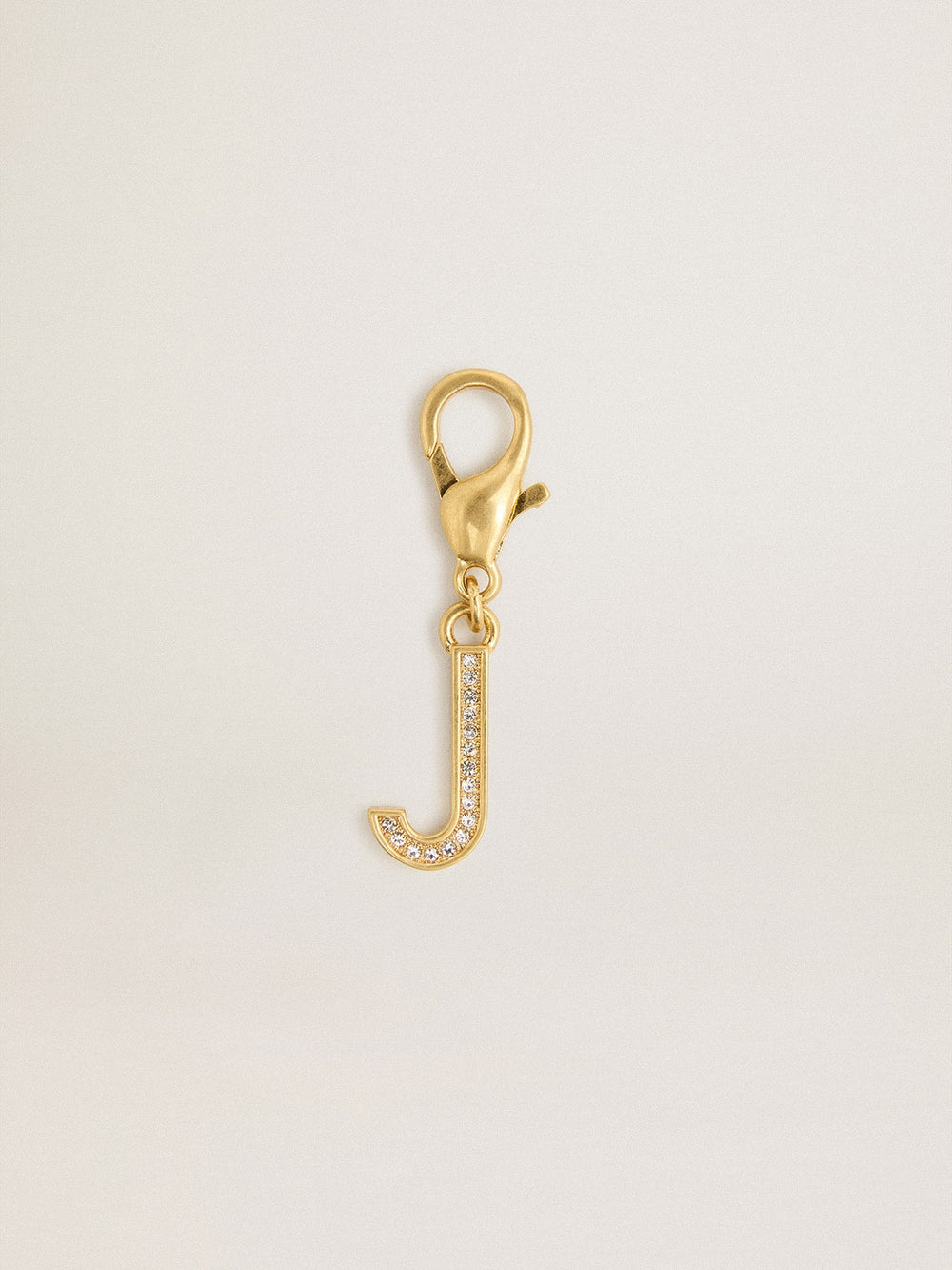 Letter J charm in gold-colored brass with crystals