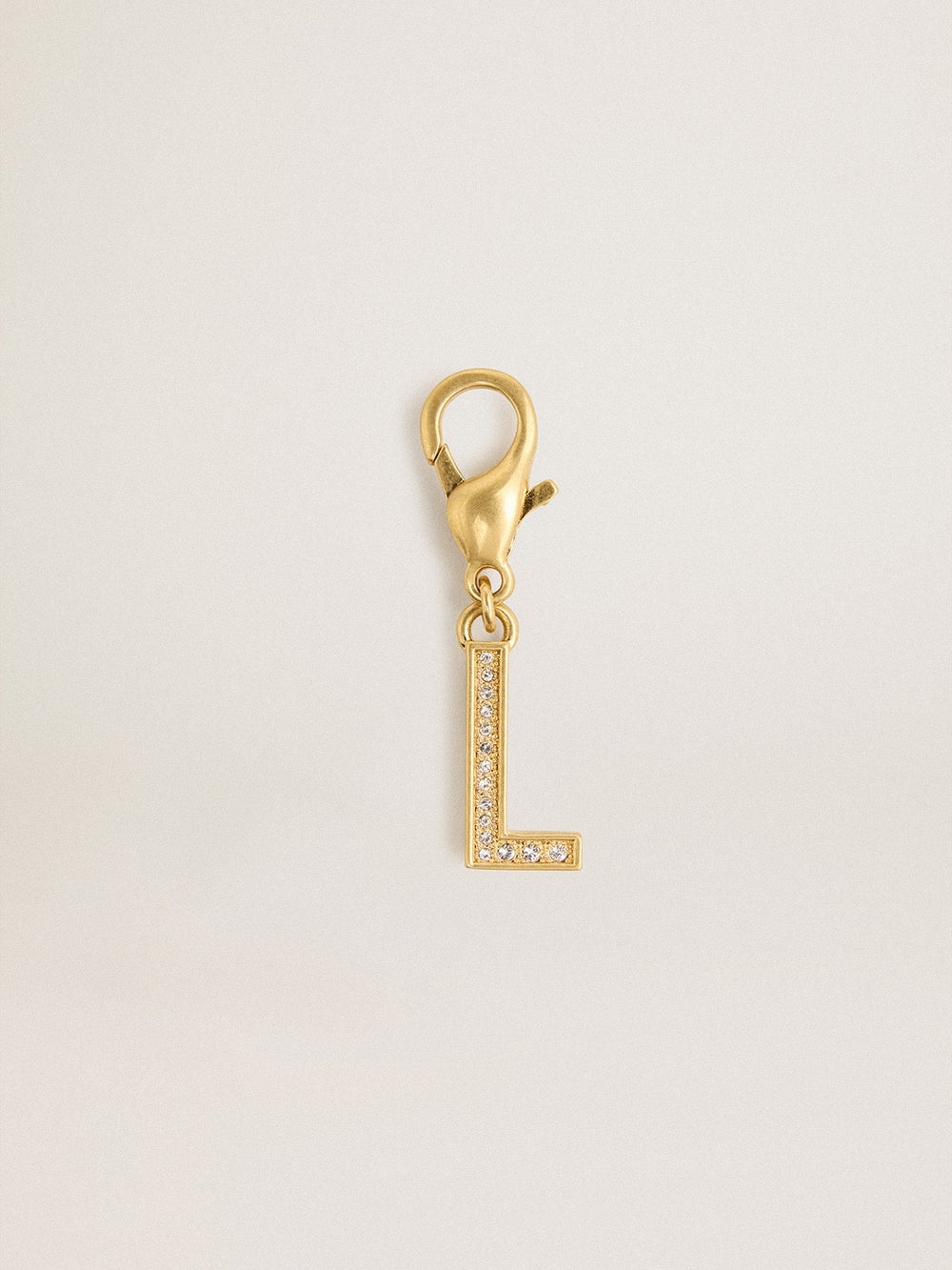 Letter L charm in gold-colored brass with crystals