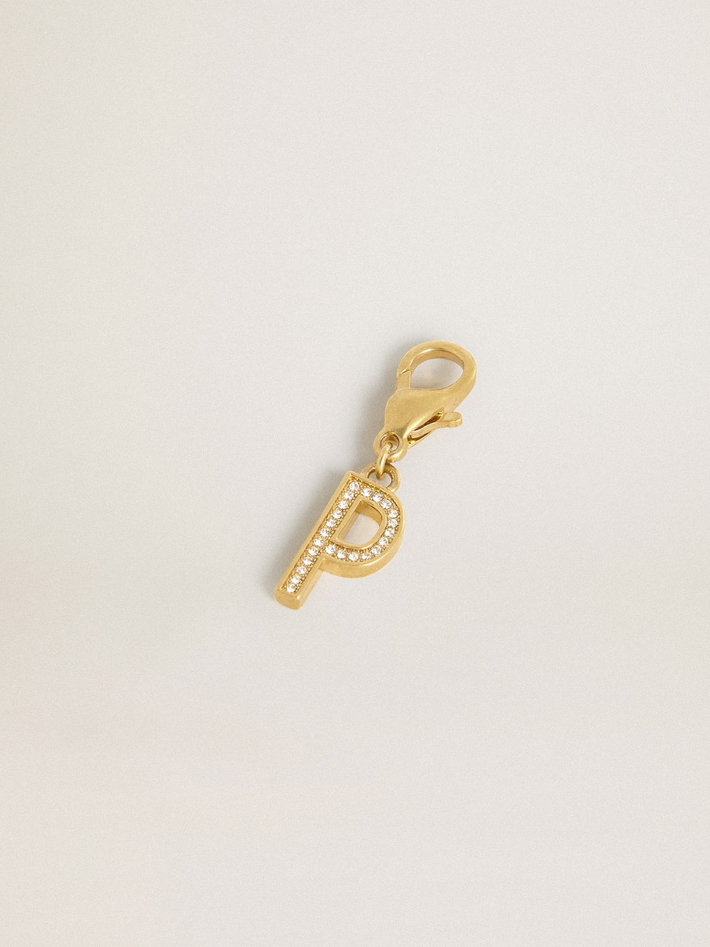 Letter P charm in gold-colored brass with crystals