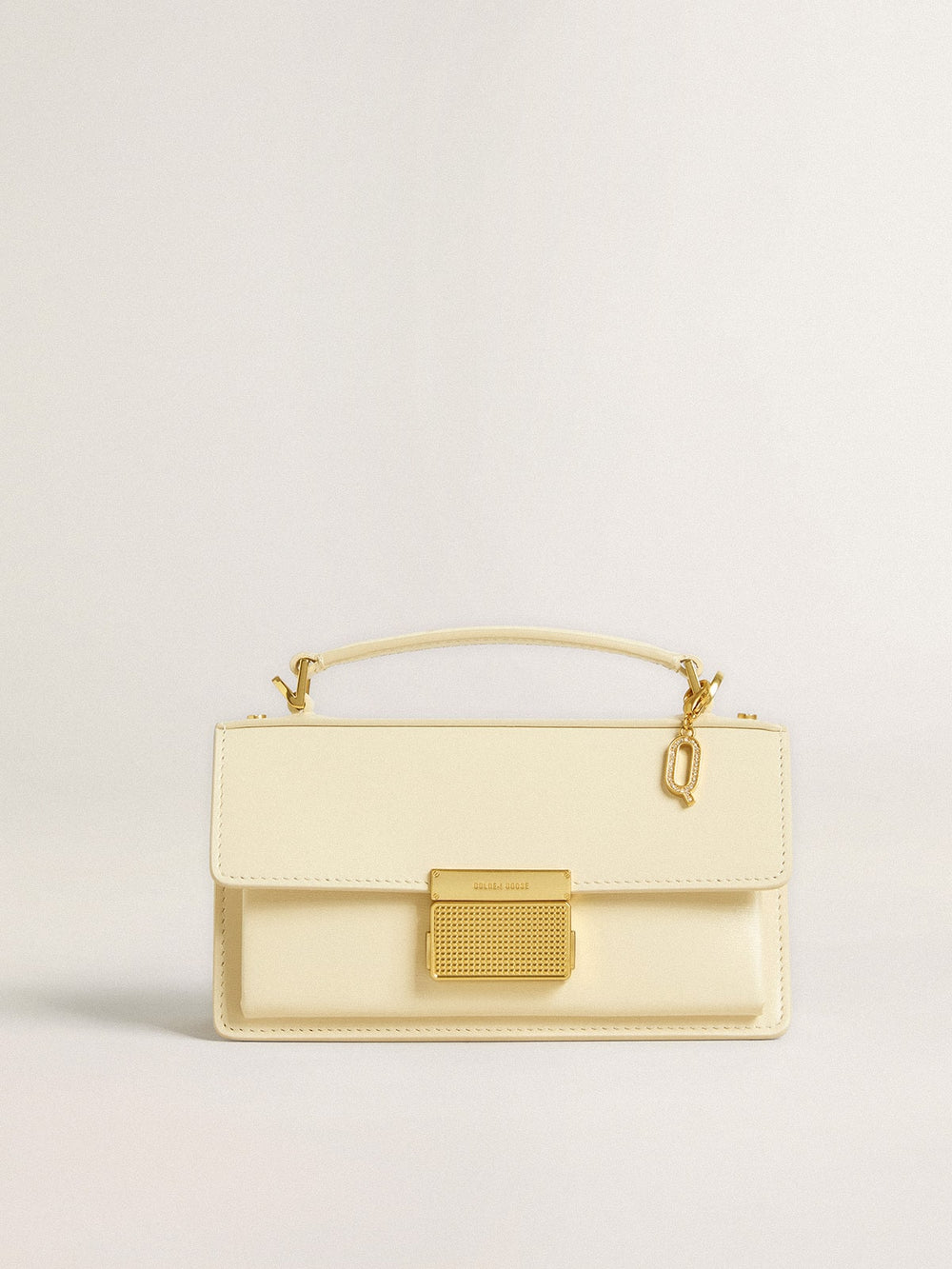 Letter Q charm in gold-colored brass with crystals