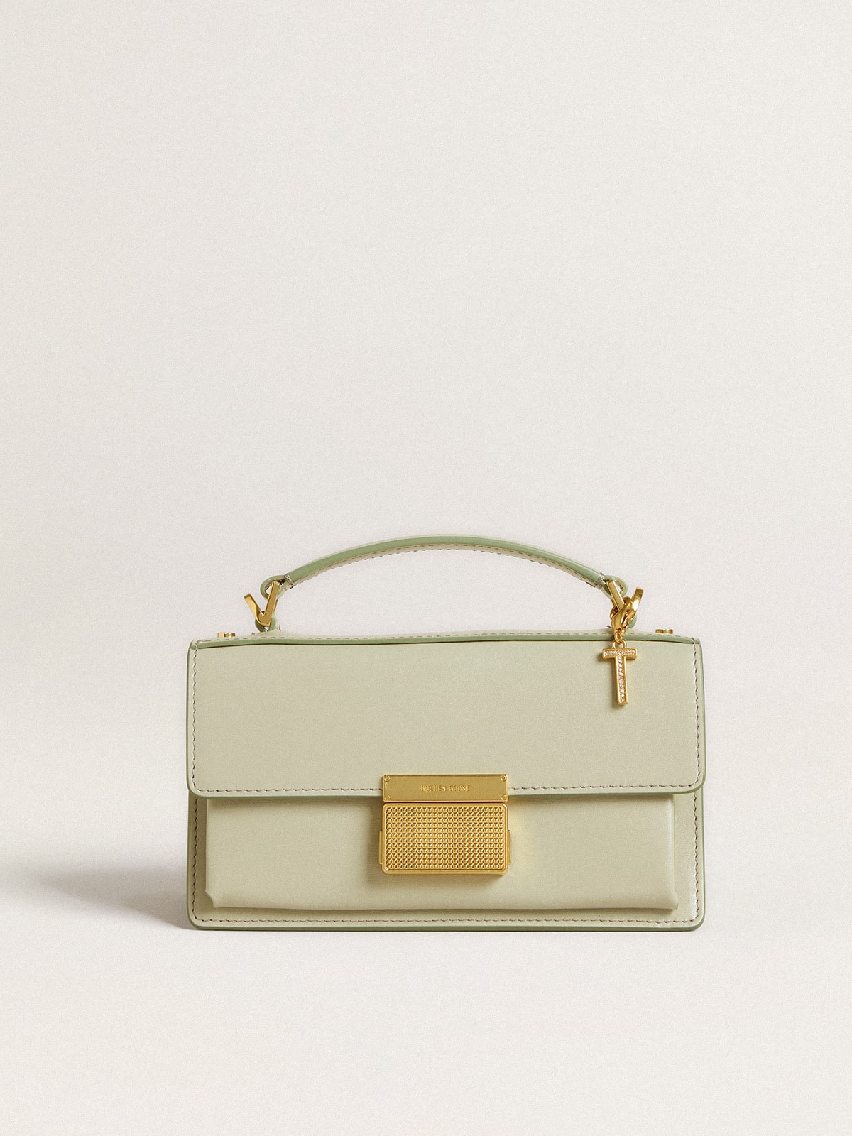 Letter T charm in gold-colored brass with crystals