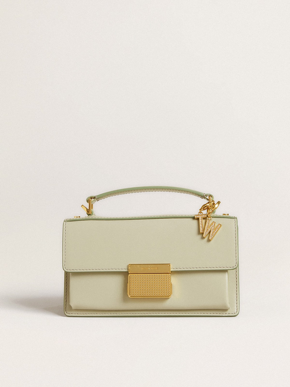 Letter T charm in gold-colored brass with crystals