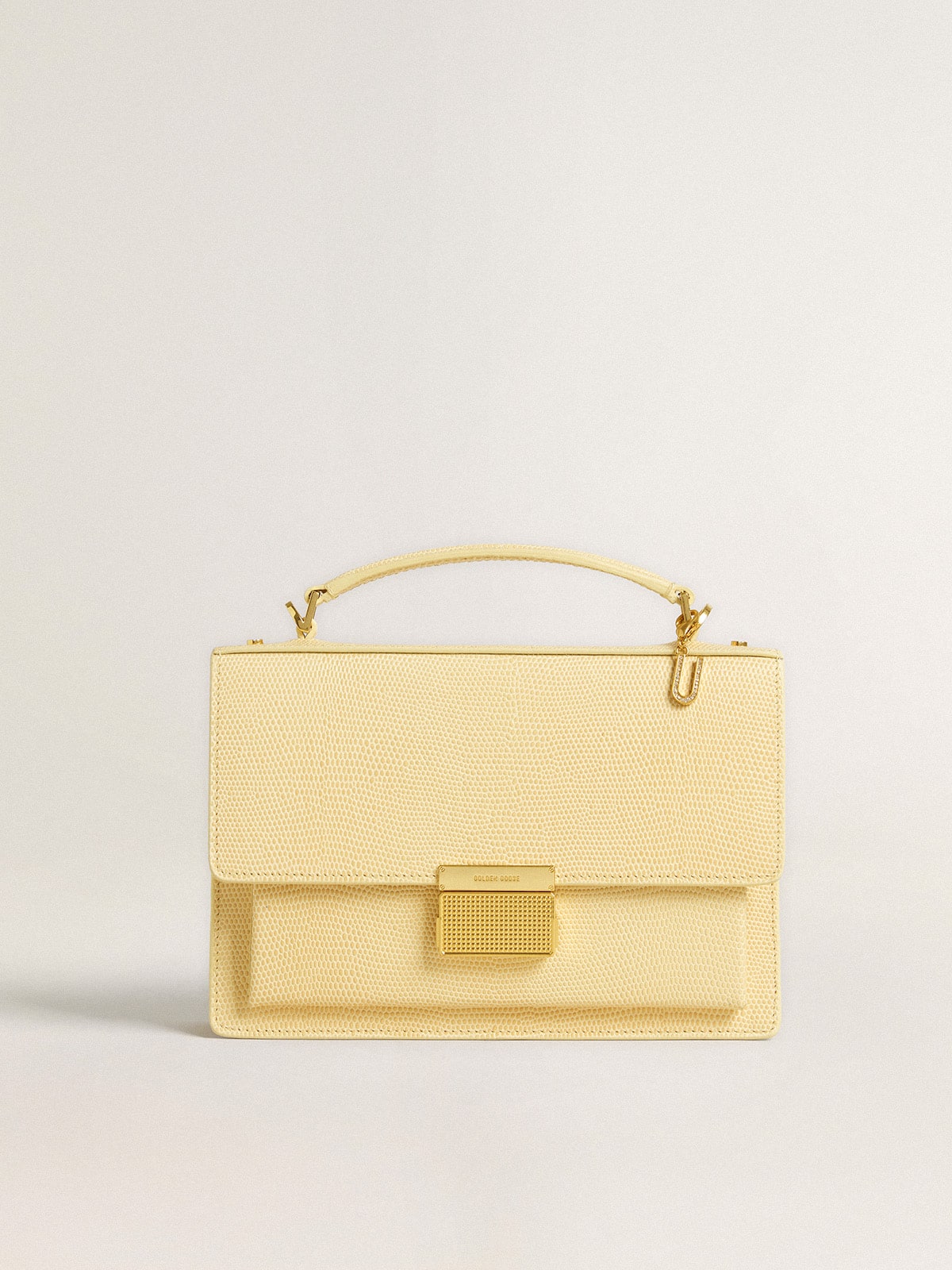 Letter U charm in gold-colored brass with crystals