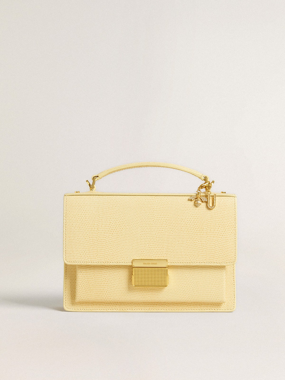 Letter U charm in gold-colored brass with crystals