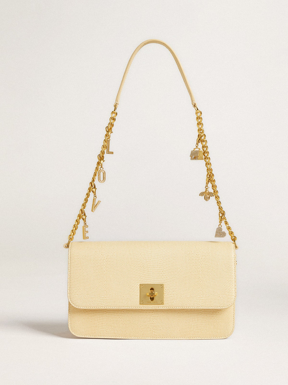 Letter V charm in gold-colored brass with crystals