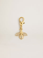 Bee-shaped charm in gold-colored brass with crystals
