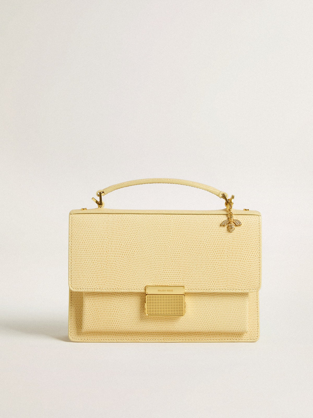 Bee-shaped charm in gold-colored brass with crystals