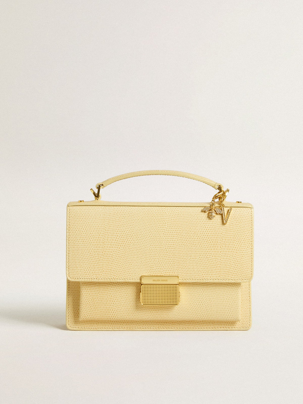 Bee-shaped charm in gold-colored brass with crystals