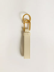 Worn white keyring