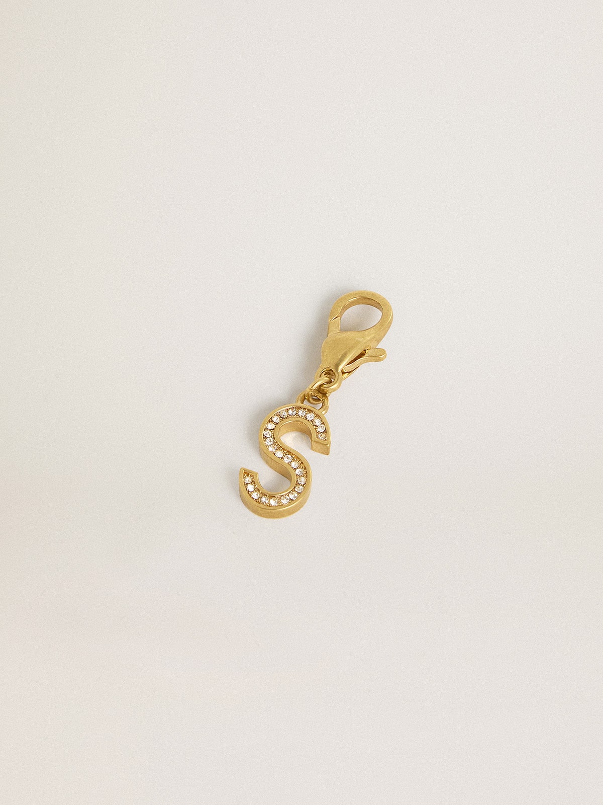 Letter S charm in gold-colored brass with crystals