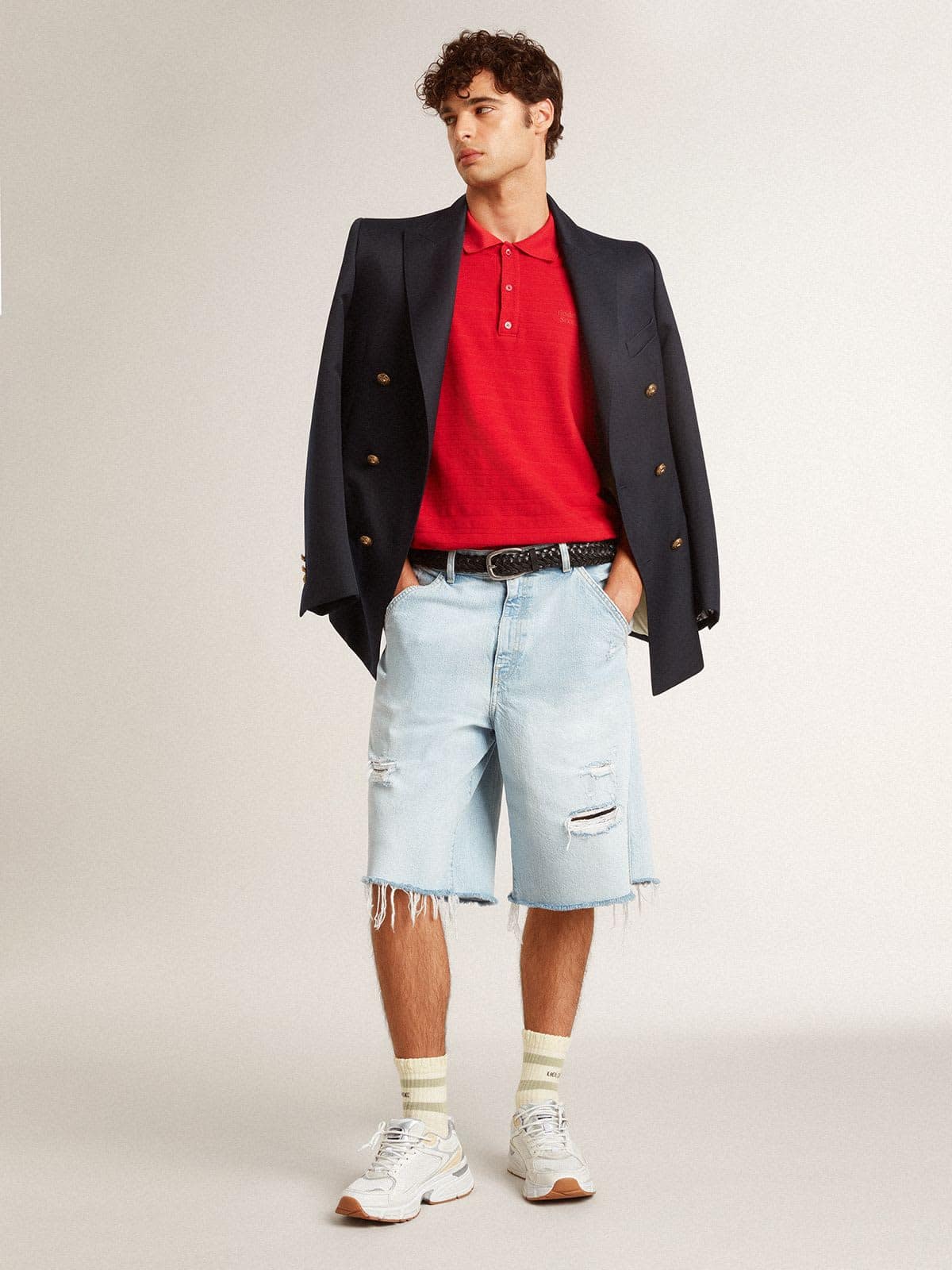 Worn-white socks with distressed details and sage-green stripes