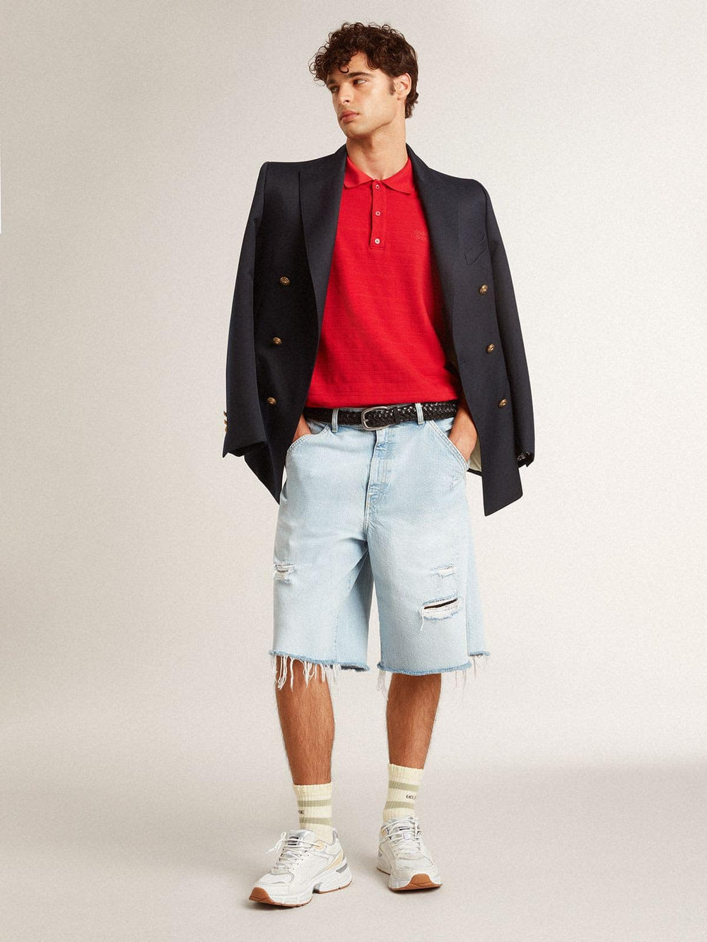 Worn-white socks with distressed details and sage-green stripes