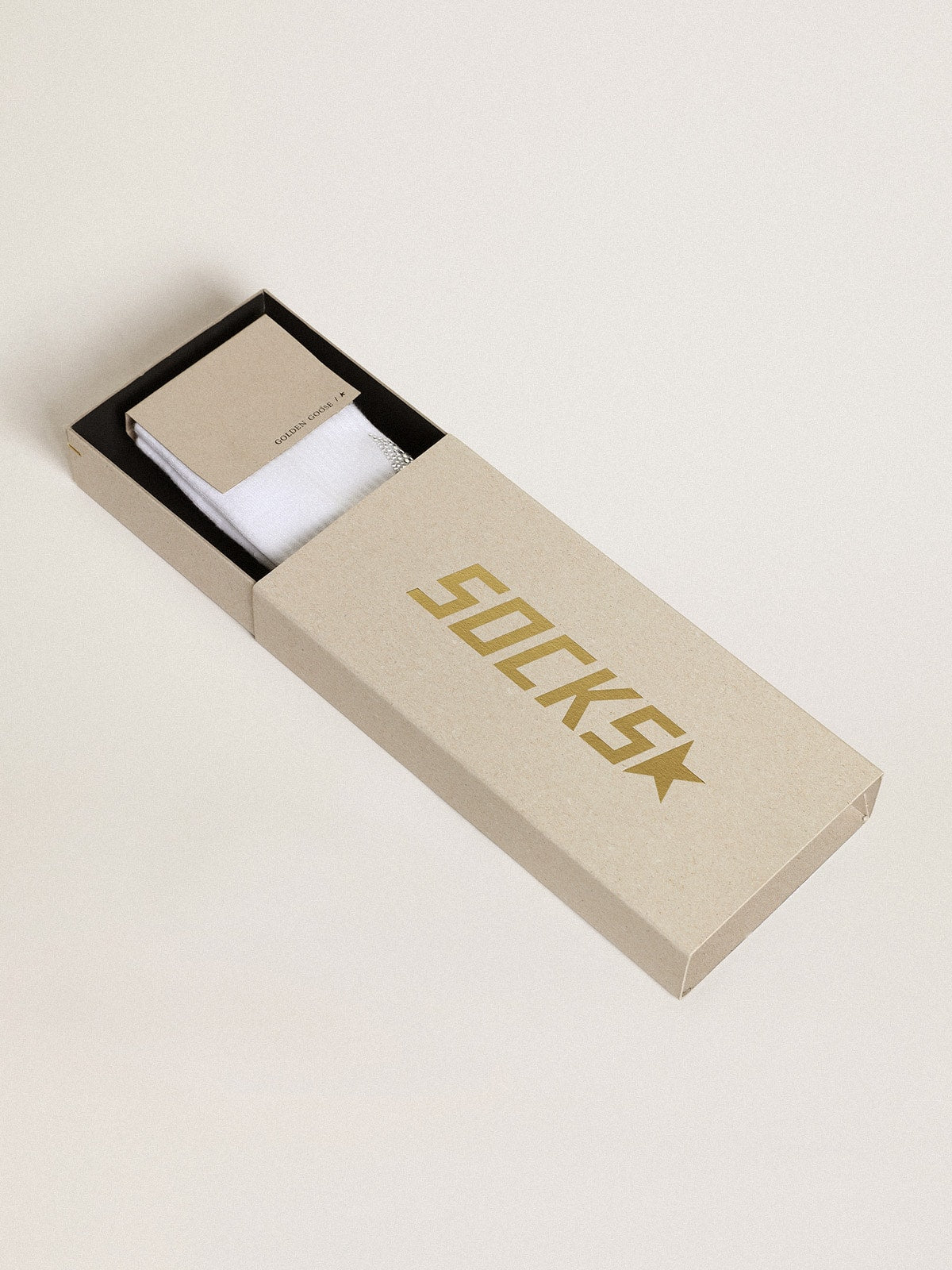 White socks with crystal star on the back